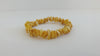 BALTIC AMBER CHIPS STRETCH BRACELET, BUTTER-WHITE  8-10 gm 8-13 mm  8 " ALLUREGEM S1264