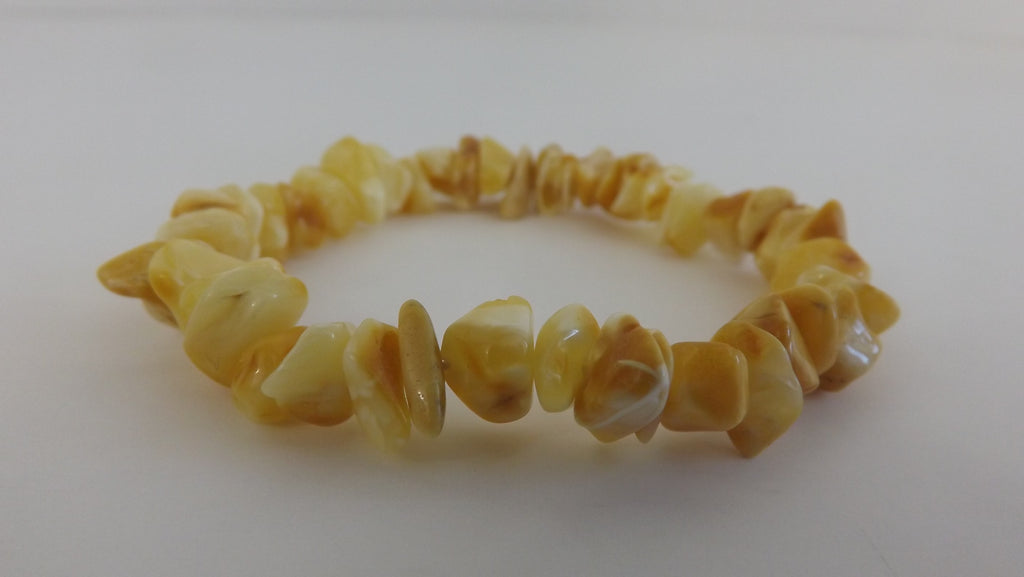 BALTIC AMBER CHIPS STRETCH BRACELET, BUTTER-WHITE  8-10 gm 8-13 mm  7.5 " ALLUREGEM S1202