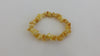 BALTIC AMBER CHIPS STRETCH BRACELET, BUTTER-WHITE  8-10 gm 8-13 mm  7.5 " ALLUREGEM S1202