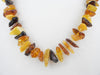 BALTIC AMBER NECKLACE CHIPS GRADUATED, POLISHED MULTI-COLORED 30 gm 19 " ALLUREGEM S1276