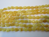 Natural Baltic Amber Bead Strands, Flat Oval Butter-White, 4 - 5 grams 10 - 12 mm, 8" Alluregem E2234