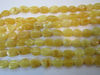 Natural Baltic Amber Bead Strands, Flat Oval Butter-White, 4 - 5 grams 10 - 12 mm, 8" Alluregem E2234