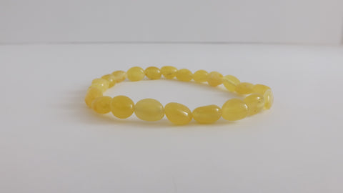 GENUINE BALTIC AMBER STRETCH BRACELET OVAL, BUTTER  6-7  gm  8 " ALLUREGEM S1211