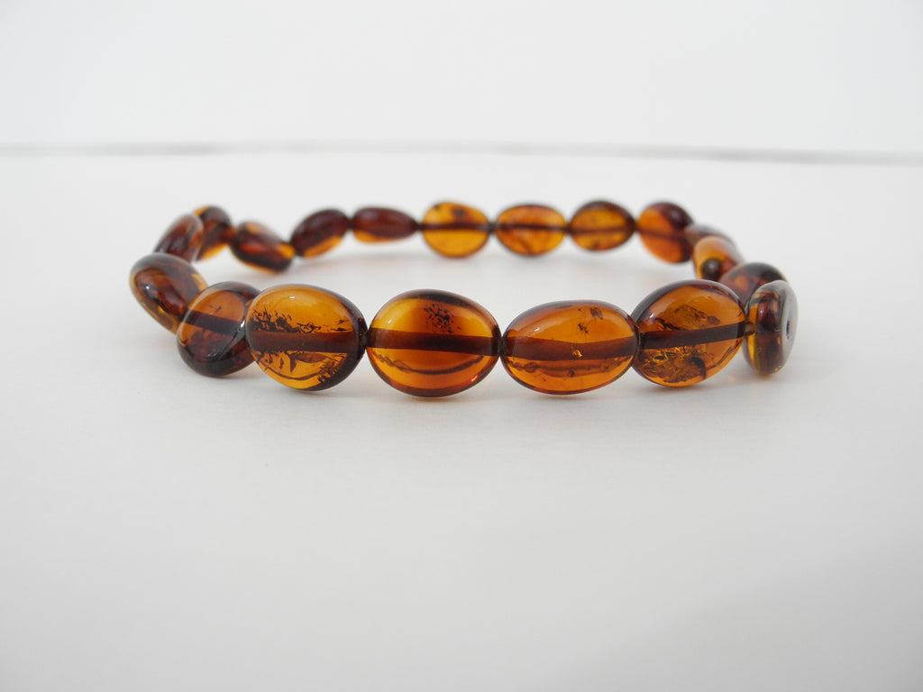 GENUINE BALTIC AMBER STRETCH BRACELET, OVAL DK HONEY, 6 gm  8 "  ALLUREGEM S1260