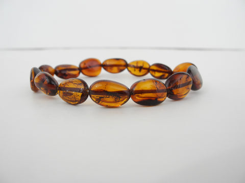 GENUINE BALTIC AMBER BEADS STRETCH BRACELET POLISHED HONEY  7.2 gm  7.5 "  ALLUREGEM S1768