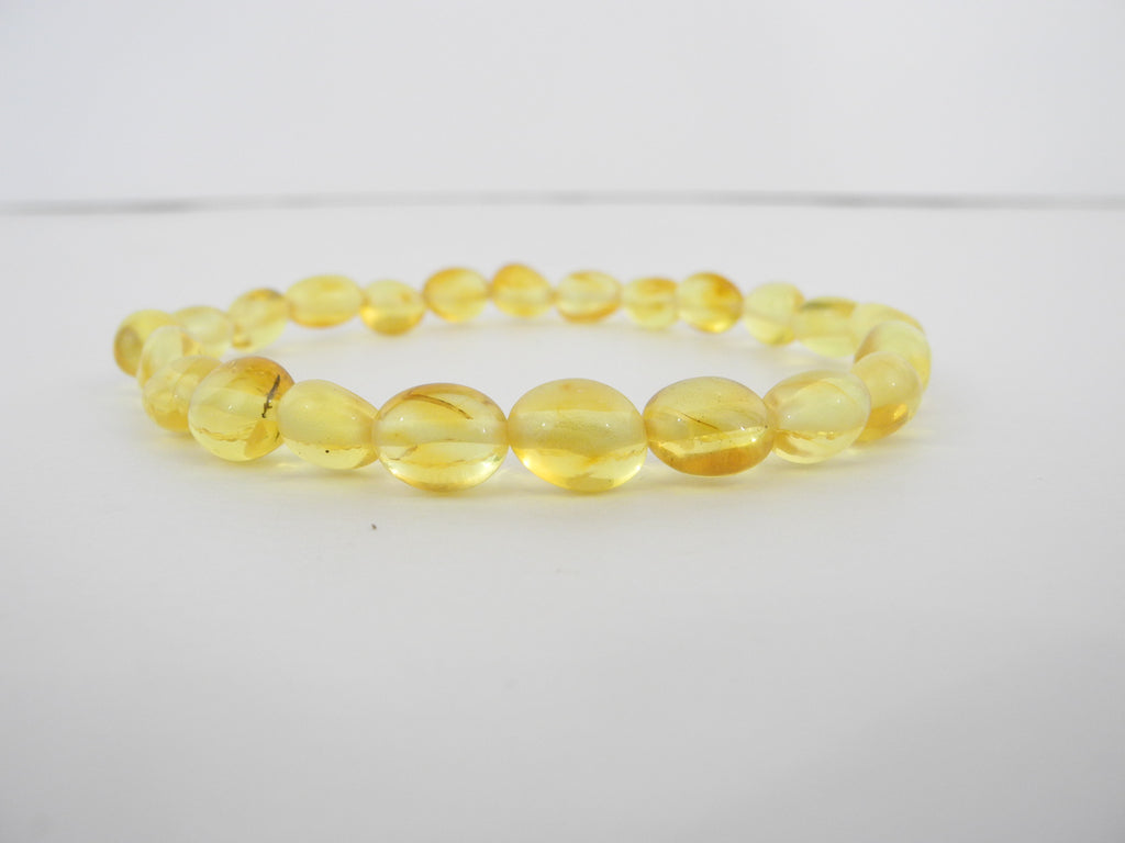 BALTIC AMBER STRETCH BRACELET LEMON, OVAL 5-6 gm  8-9 mm 8 " ALLUREGEM S1127