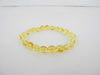 BALTIC AMBER STRETCH BRACELET LEMON, OVAL 5-6 gm  8-9 mm 8 " ALLUREGEM S1127