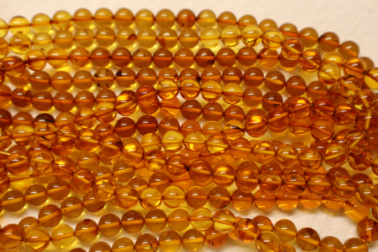 4-7mm - Tumbled polished loose amber beads in chip shape for jewelry making 4-7mm - Tumbled polished loose amber beads in chip shape for jewelry making