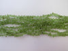 NATURAL PERIDOT CHIPS STRAND,GREEN, 23-27 gm, 3 mm, 35 " ALLUREGEM S1036