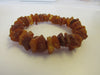 GENUINE BALTIC AMBER RAW CHIPS STRETCH BRACELET  HONEY   22 gm  8 "  ALLUREGEM S1824